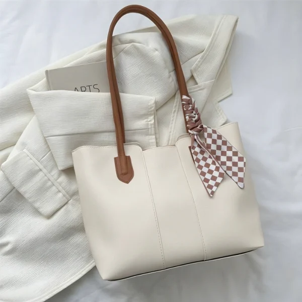 Women’s PU leather tote bag with large capacity for everyday use in white color