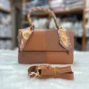 Women’s crossbody bag in PU leather with a compact stylish design for everyday use in brown