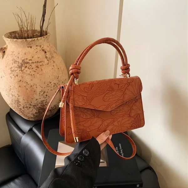 “Women’s PU crossbody shoulder bag with a compact design for everyday use in brown”