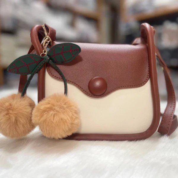 Women’s PU leather crossbody and shoulder bag with compact versatile design for everyday use in white