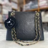 Women's shoulder bag made of PU leather with a spacious functional design for everyday use in black