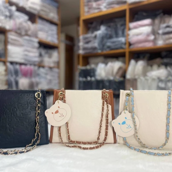 Women's shoulder bag made of PU leather with a spacious functional design for everyday use in multi-color display