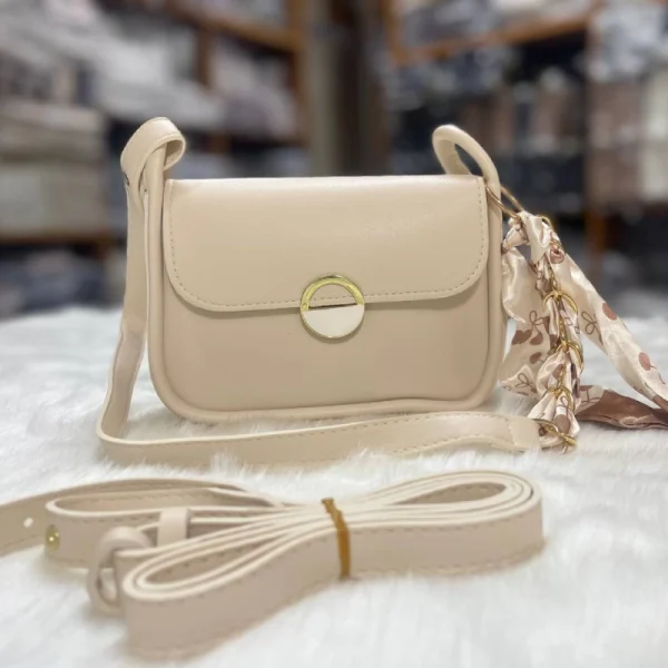 Women’s PU leather shoulder and crossbody bag with versatile carrying options for everyday use in white