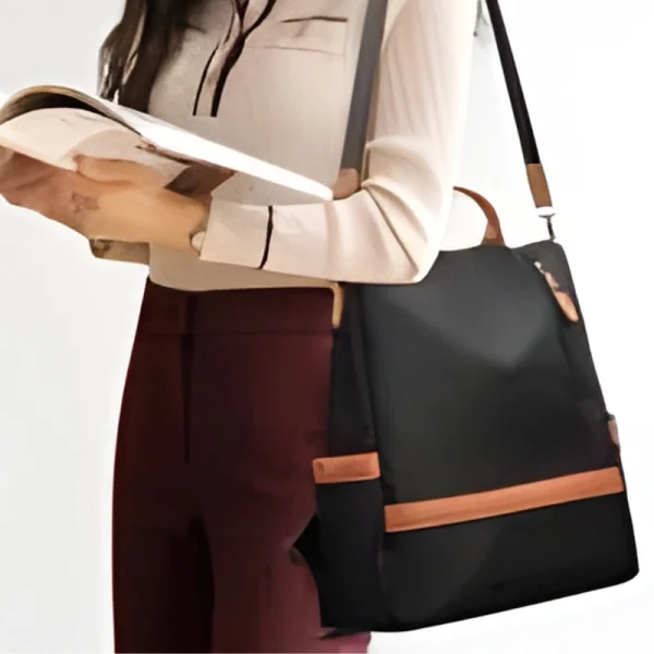 “Women outdoor tote bag made with durable nylon, featuring large capacity for daily use and travel in orange and black outfit.”